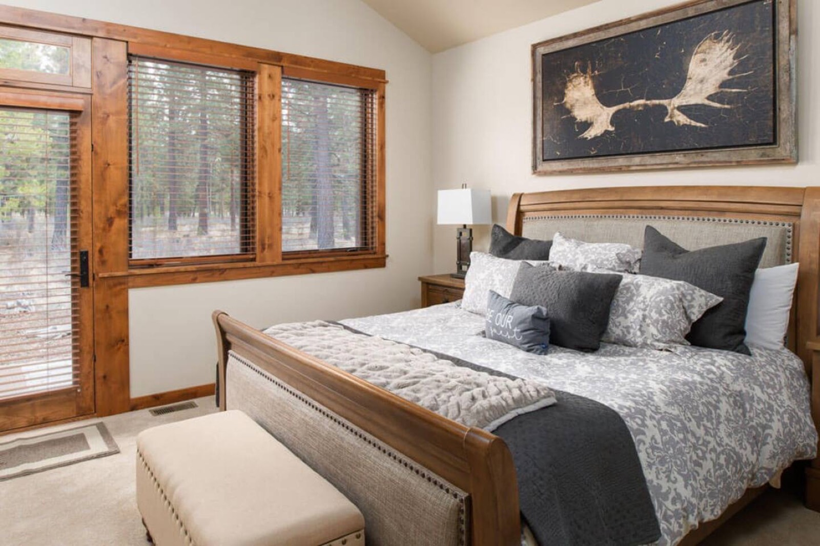 Main-floor bedroom with a king bed and en-suite bathroom