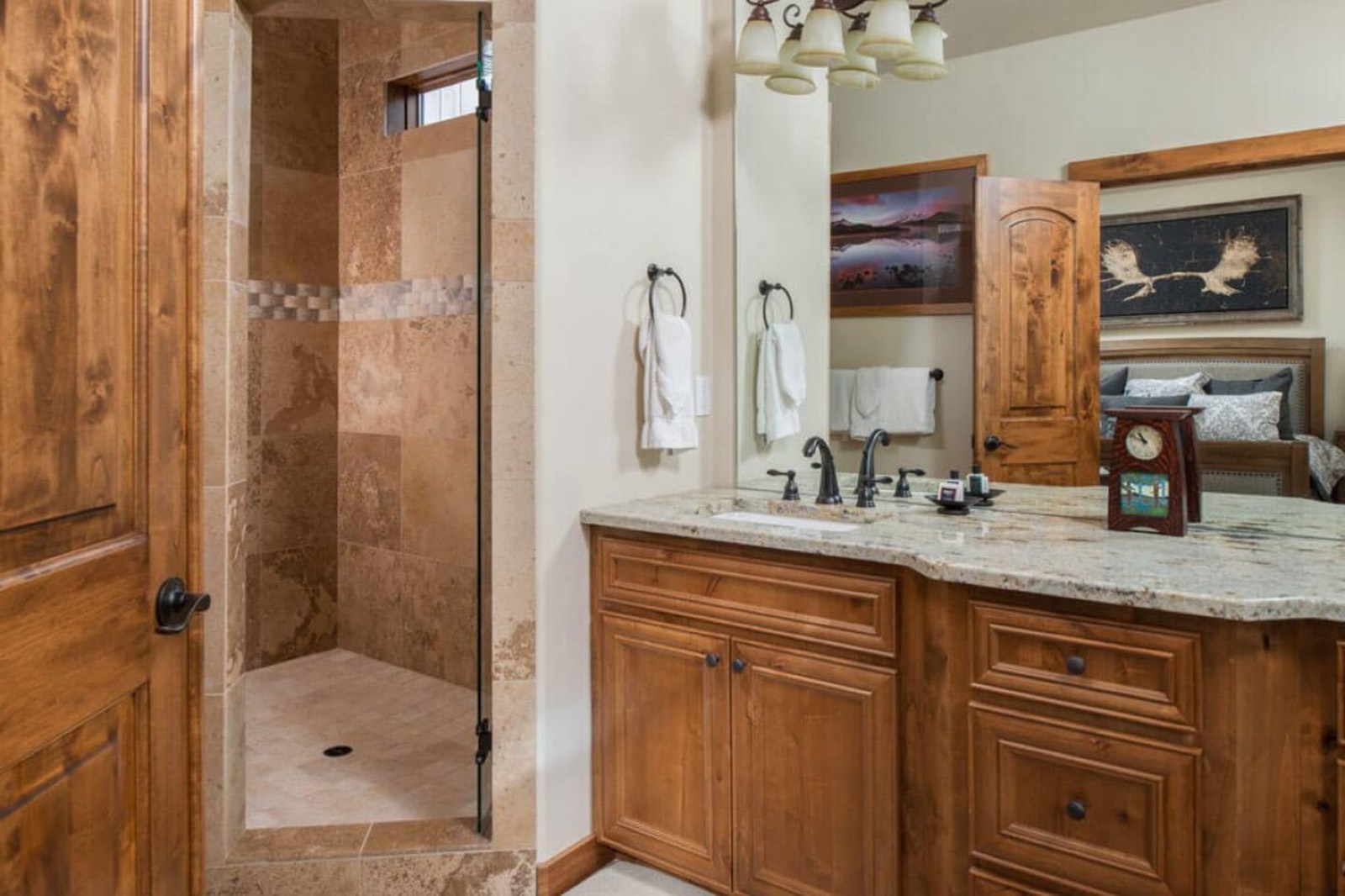 En-suite bathroom with a tiled shower and double vanity