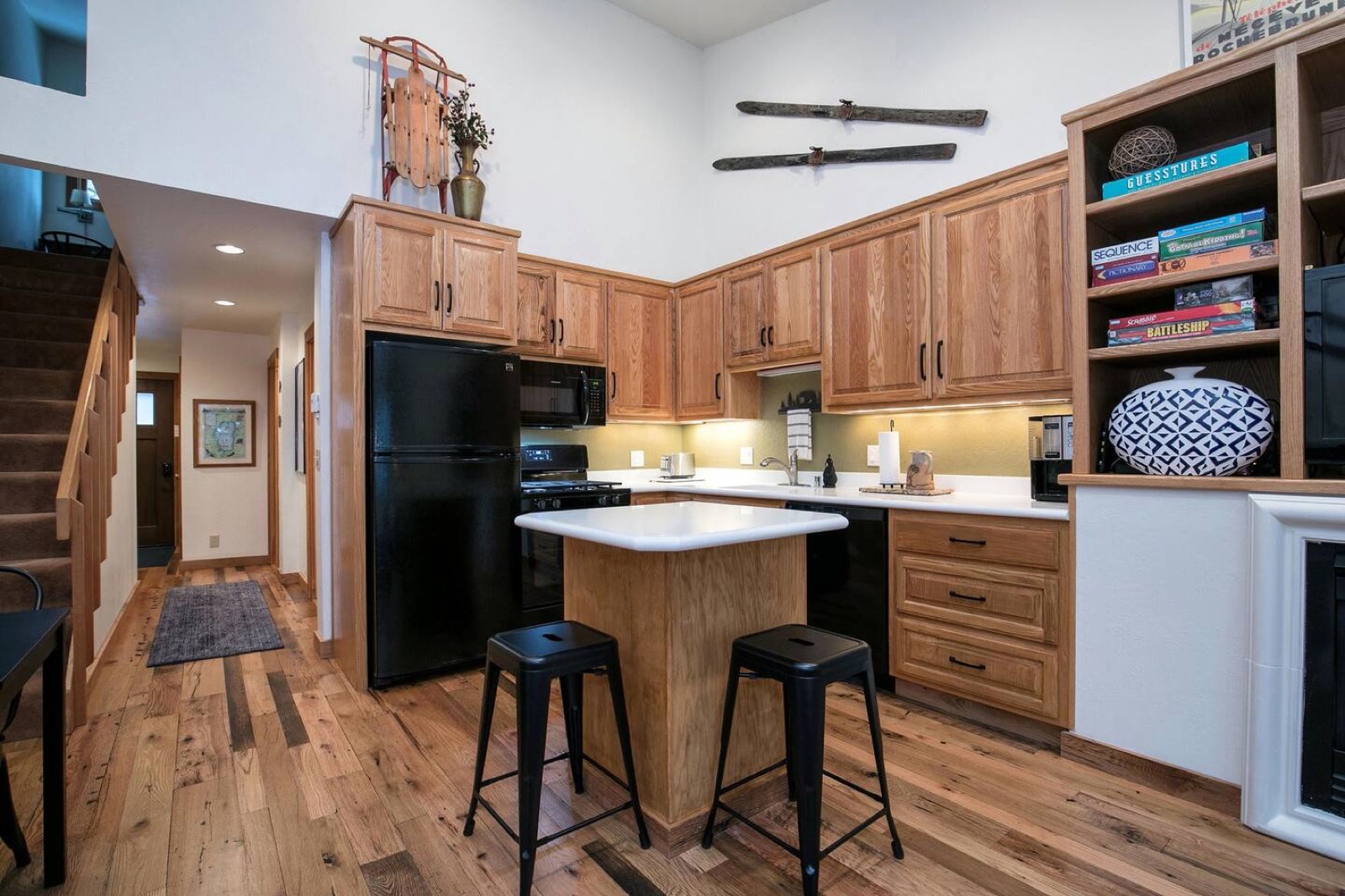 Kitchen with wood cabinets, stone counters and stainless-steel appliances